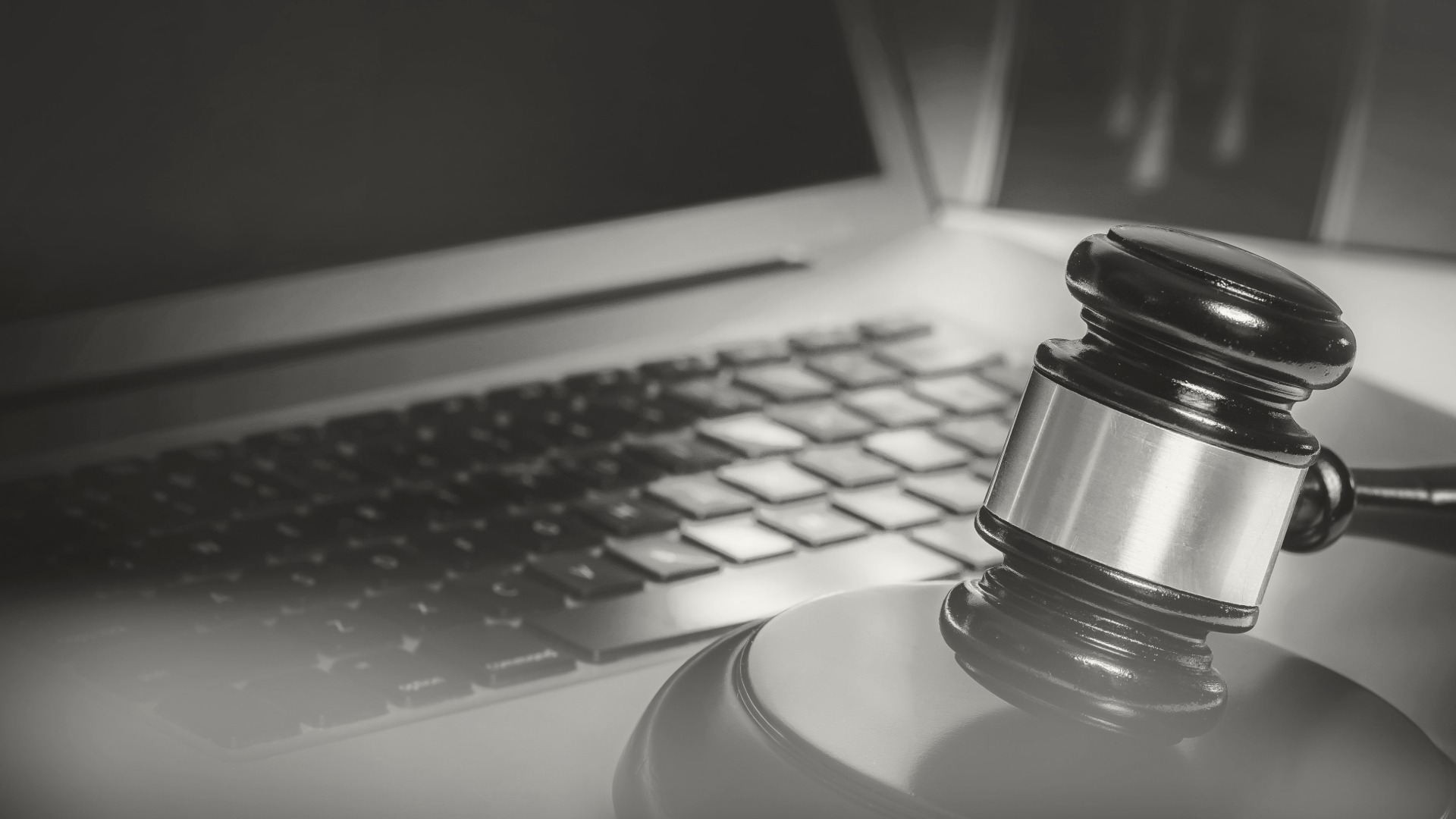 Judge's gavel beside a laptop — ADA Title II compliance 2027